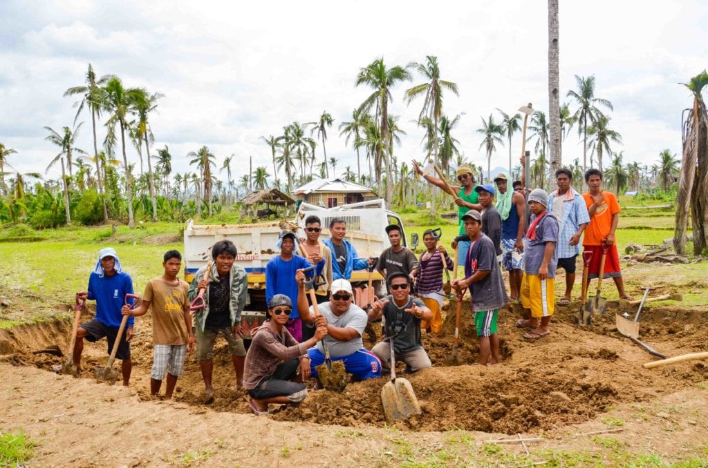 Men Digging Earth